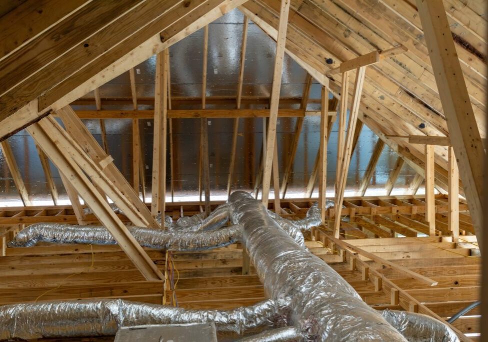 New home construction attic exposed rafters hvac duct work trusses