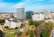 South Carolina Statehouse and Columbia skyline on a sunny morning.